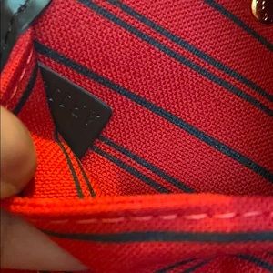 Comes with Bag and wristlet